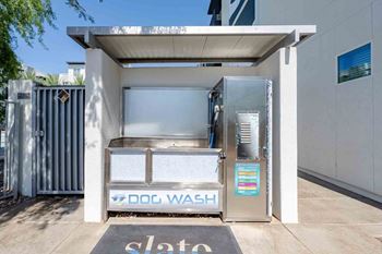 Pet-friendly community with dog washing area and pet run
